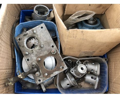 Assorted gearbox and engine mountings; also four new cast aluminium Alvis back plates and a box of headlamp parts.