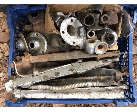 A box containing assorted lighting bar supports, headlamp holders etc. 