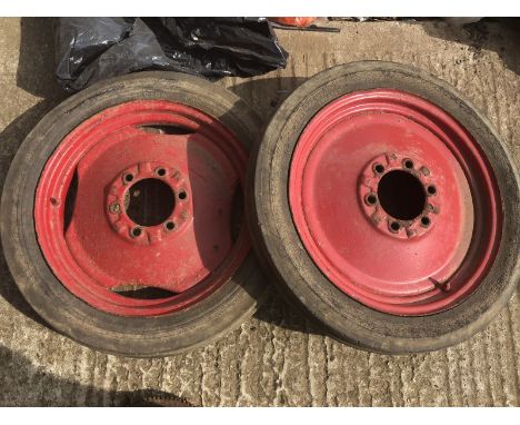 Two pressed steel tractor wheels,