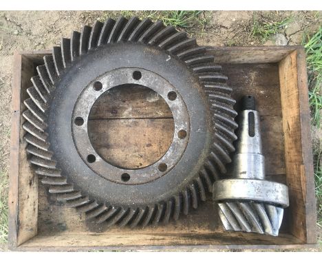 A crown wheel and pinion, possibly vintage Bentley, two boxes of BDC magazines, two half shafts and various other parts.