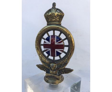 An early RAC polished brass members badge with Union Jack enamel centre, by Elkington and Co., stamped D2093, display base mo