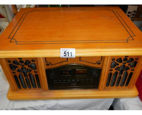 A wood case record player. COLLECT ONLY.