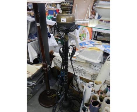A Victorian adjustable iron standard lamp complete with shade, COLLECT ONLY.