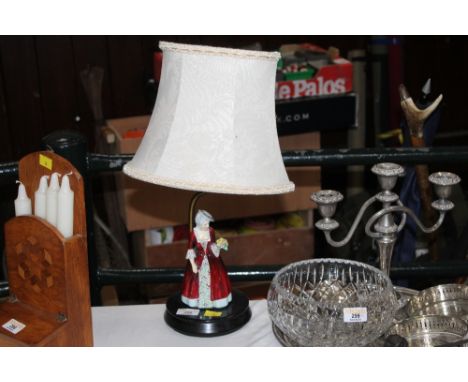 Table lamp and shade with figural Doulton style base