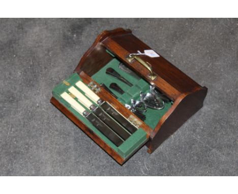 A vintage cutlery carrier and cutlery