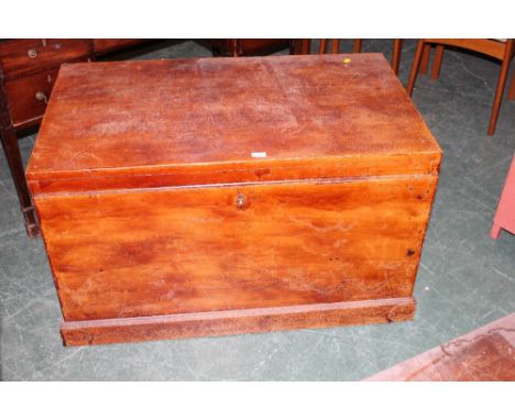 A Victorian stained pine trunk, top with square edge, 61 cm high 