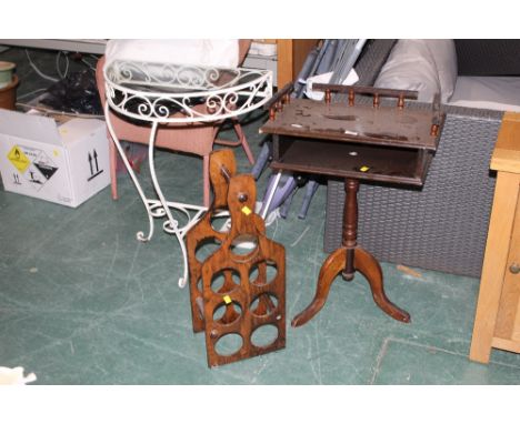 A modern laminate 7 bottle wine rack together with a dark telephone table , and a white metal semi circular console table