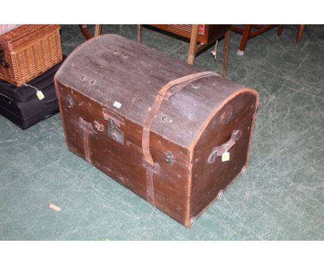 A late Victorian brown canvas domed top trunk by Cole Brothers Ltd. of Sheffield, with internal tray 58cm high by 80 cm wide 