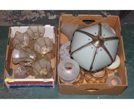Two boxes of light shades 