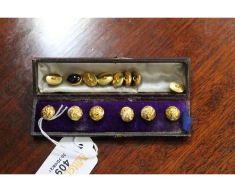 Two sets of vintage buttons