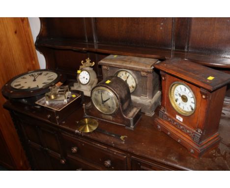 A late Victorian oak mantle clock by Fattorini &amp; Sons of Bradford, four other clocks and a clock movement (all in poor co