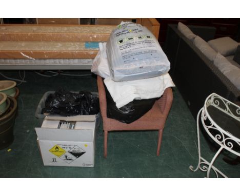 A woven fibre arm chair, a quantity of bagged linen, a box of mixed books and a small quantity of used tools 