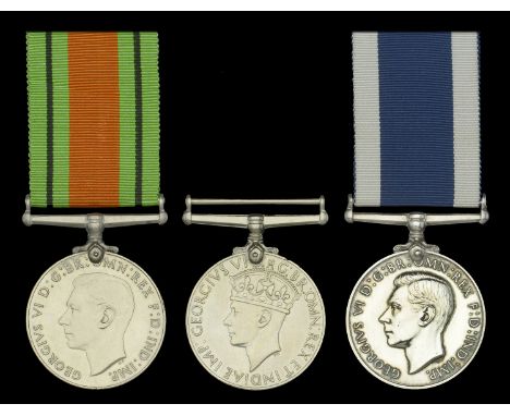 Three: Yeoman of Signals R. A. I. Newman, Royal Navy  Defence and War Medals 1939-45; Royal Navy L.S. & G.C., G.VI.R., 1st is