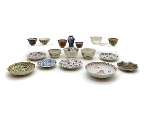 A collection of Japanese cups and saucers,18-19th century, including famille rose, imari, blue and white, painted with birds 