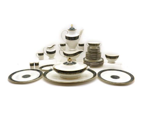 An extensive Royal Doulton Dinner service, 20th century, in the Carlyle pattern, comprising, a pair of tureens, 31cm high, tw