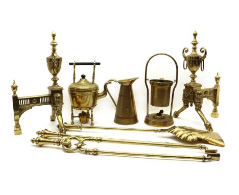 A set of brass fire tools, 20th century, comprising tongs, a poker, 70cm long, and a shovel together with a pair of fire dogs