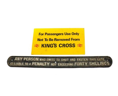 A double sided King's Cross aluminium sign,'For Passengers Use Only, Not to be Removed From King's Cross',52cm wide25cm hight