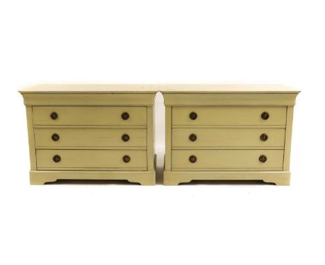 A pair of Grange Louis Phillipe style commodes, each with a moulded top over three drawers, with brass ring handles, raised o