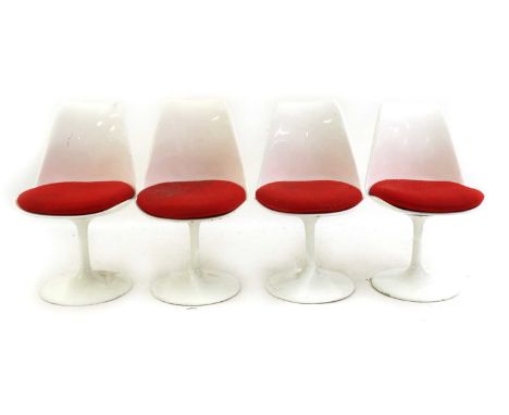 A set of four Arkana tulip chairs20th Century, each with a red upholstered pad seat on a spreading base51cm wide44cm deep85cm