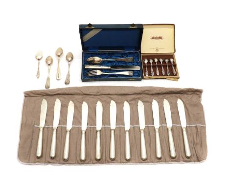 A collection of silver flatware, comprising a set of eleven fish knives, by Brook &amp; Son, Sheffield 1905, the solid silver