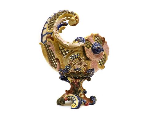 A Zsolnay porcelain centrepiece,19th century, of shell form, on a pink and blue group, featuring pierced decoration throughou