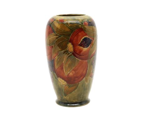 A Moorcroft pottery 'Pomegranate' pattern vase for Liberty &amp; Co,c.1910, of ovoid shape, tubeline-decorated and bearing pr