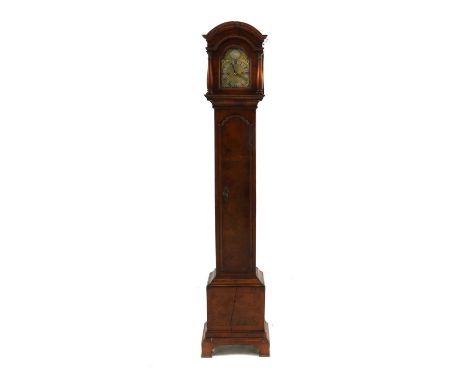 A small George III walnut longcase clock,dated 1814, by Samuel Denton of Oxford, the domed hood enclosing a brass movement wi