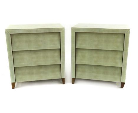 A pair of bedside chestsby Graham &amp; Green, each with three drawers and an imitation shagreen finish behind clear perspex,