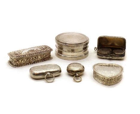 A collection of silver sovereign cases,comprising a double sovereign and vesta case, Birmingham 1898, with scrolled foliate d