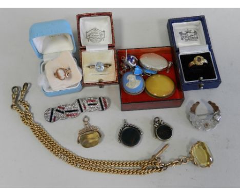 Two 9ct stone set rings, together with a 9ct cameo set ring, four various fobs with a yellow metal fob chain and T bar, a sil