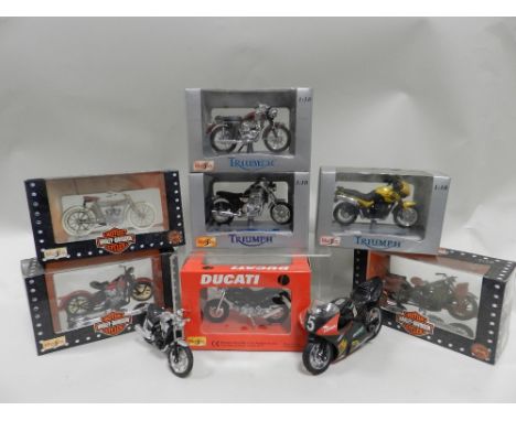 A group of boxed and unboxed motorcycles by Ertl, Ixo and others, in various scales including 9 boxed Maisto models of Harley