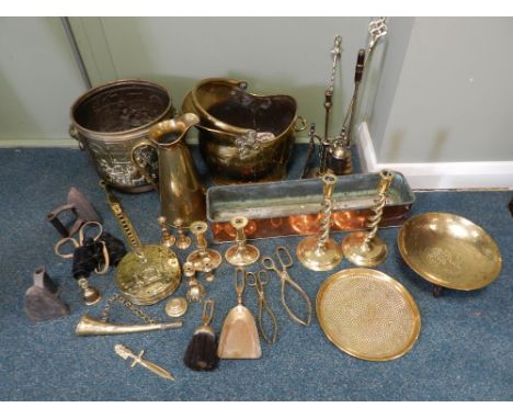 A quantity of brass and copper wares including haystack measure, chestnut roaster, fire tools, candlesticks, coal buckets etc