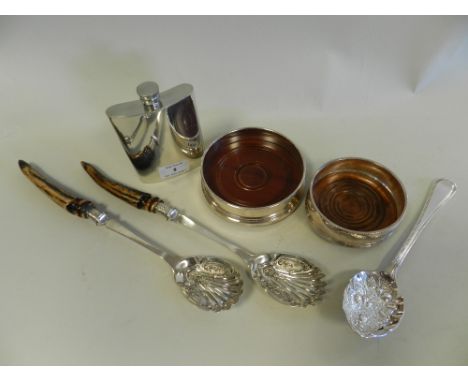 A pair of late Victorian electroplated horn handled salad servers together with an electroplate fruit spoon, two electroplate