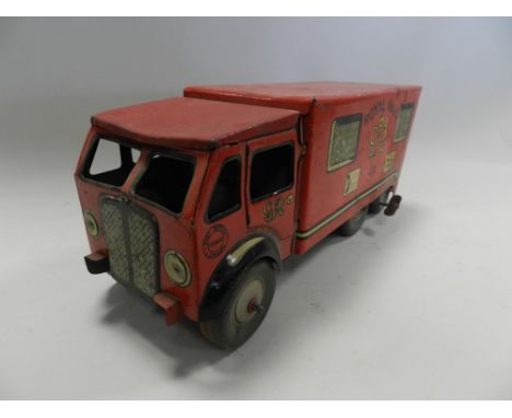 A small quantity of tinplate toys including a Tri-Ang double decker bus, branded Bovril and Ovaltine, a Triang Express locomo