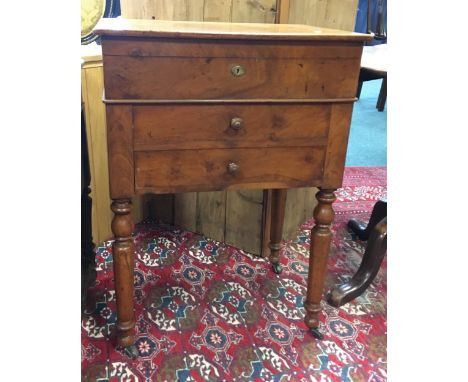 A French mahogany washstand, 19th century with fitted comparmented interior above two drawers on ring turned legs 55cm wide, 