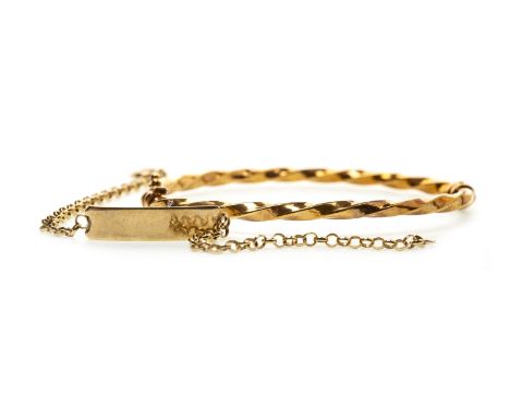 NINE CARAT GOLD BANGLE, of ropetwist design, 63mm inner diameter, marked 375, 3.8g, along with a nine carat gold identity bra