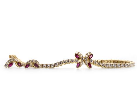 RUBY AND DIAMOND BRACELET, set with round brilliant cut diamonds totalling approximately 5.50 carats, with a central butterfl