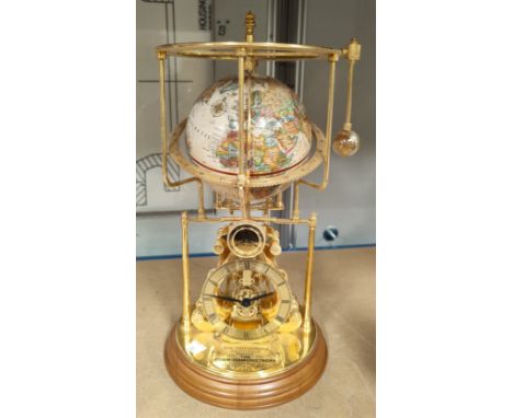 A Smithsonian 'Cosmochronotrope' by Franklin Mint, height 36 cm.&nbsp;&nbsp;There is no seconds hand.&nbsp; It seems to be co