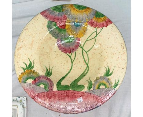 A large shallow dish by Clarice Cliff for Wilkinson's, diameter 45 cm.&nbsp;&nbsp;Quite a heavy potted wall plaque in good co