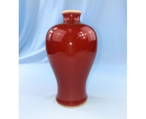 A Chinese sang de boeuf glaze inverted baluster vase height 18cm  The tall vase is damaged to rim, otherwise all pieces in go