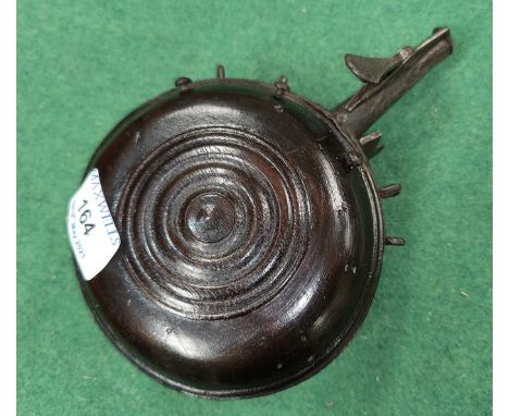 A 17th Century wooden and metal fitted wheel lock powder flask, 20cm 