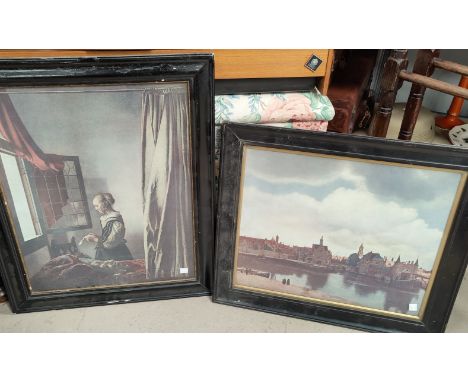 A pair of vintage prints in ebonized frames 