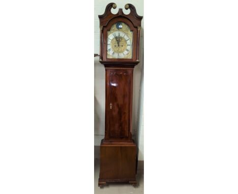 An 18th century inlaid mahogany long case clock with brass mounted swan neck pedestal and turned columns to the head, full le