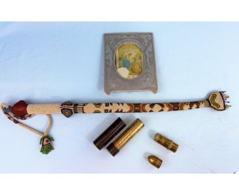 A beadwork back scratcher - WWI Turkish prisoner of war work. A trench art cigarette lighter in the form of a small shell &am