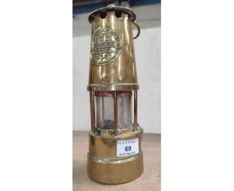 A brass cased' Protector Lamp and Lighting' miners lamp