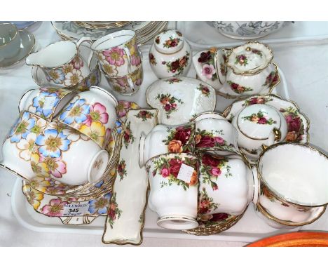 An Art Deco "Annette" 21 piece tea set; a Royal Albert set of 6 tea cups and saucers, Old Country Roses; matching trinket war