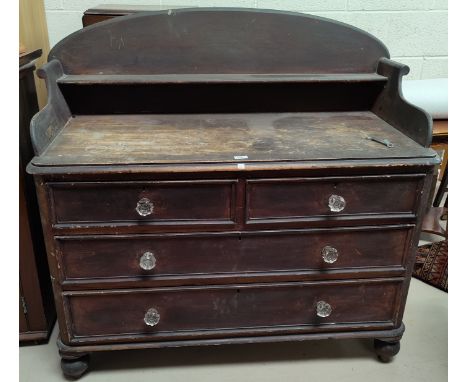 A Victorian stained pine chest of 2 long and 2 short drawers with raised back and shelf 