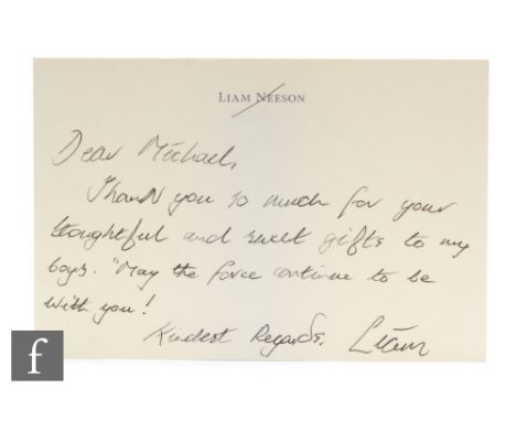 An autographed letter from Liam Neeson addressed to Michael Jackson, the text reads, 'Dear Michael, Thank you so much for the
