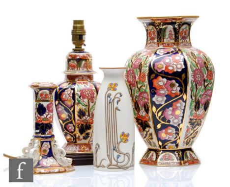 Four pieces of Masons Ironstone comprising a table lamp, vase and candlestick in the Penang pattern and an Art Nouveau patter