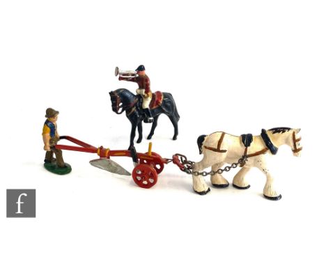 A Wend-Al horse drawn plough with farmer guiding, together with a wooden base of unknown manufacture modelled as a ploughed f